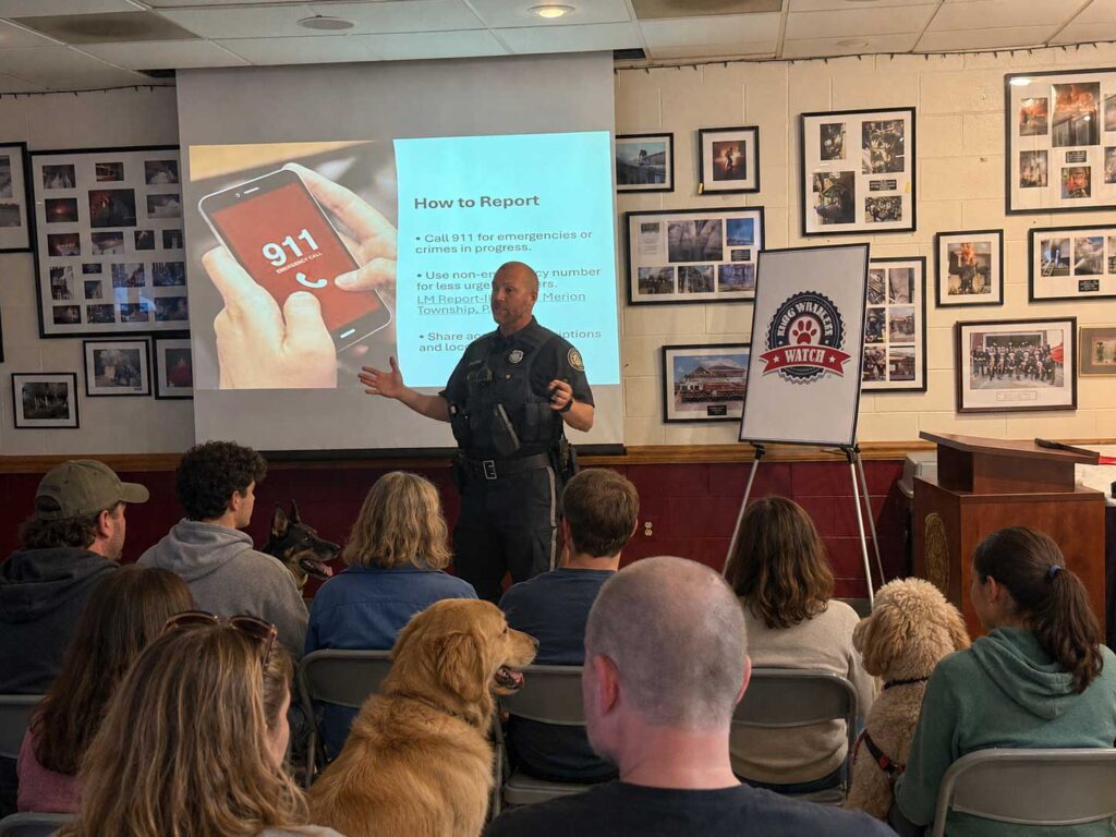 People and dogs at Lower Merion Township Dog Walker Watch training which assists in on-going community-policing efforts